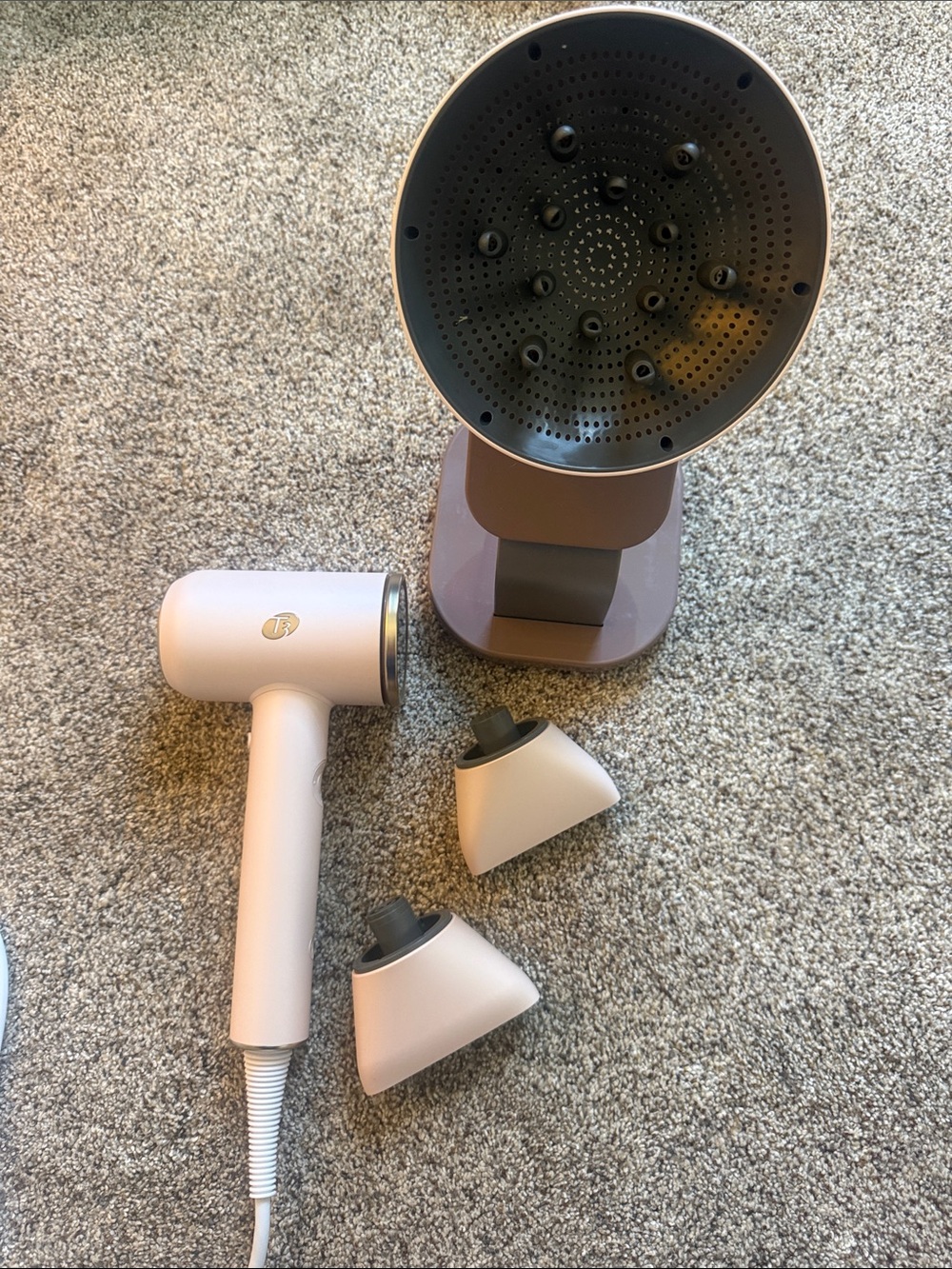 Pink Handheld Hair Dryer with Nozzle Attachments